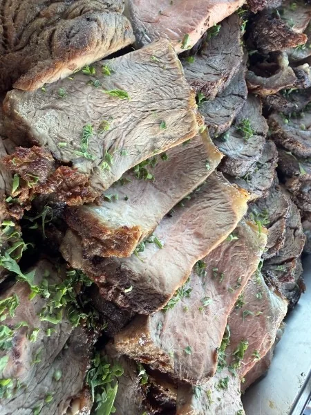 Sliced kiawe-grilled ribeye